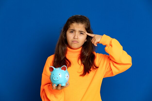 Preteen girl with yellow sweatshirt