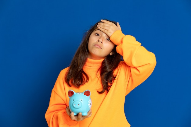 Preteen girl with yellow sweatshirt