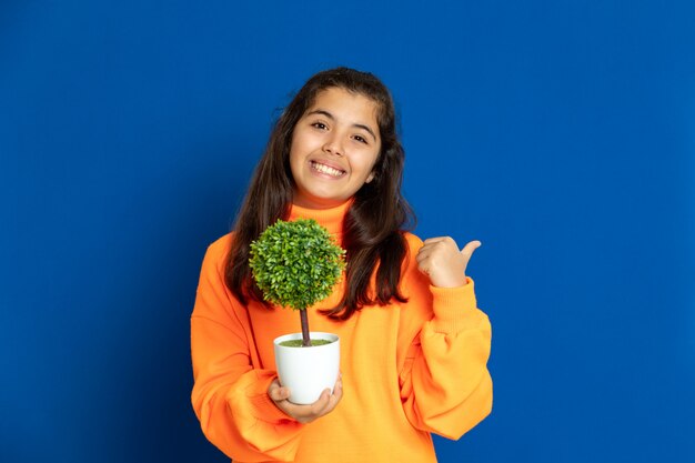 Preteen girl with yellow sweatshirt