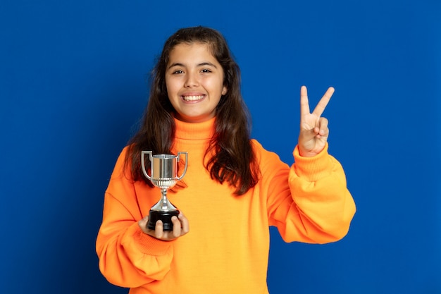 Preteen girl with yellow sweatshirt