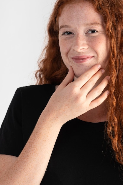 Pretty adult woman teaching sign language