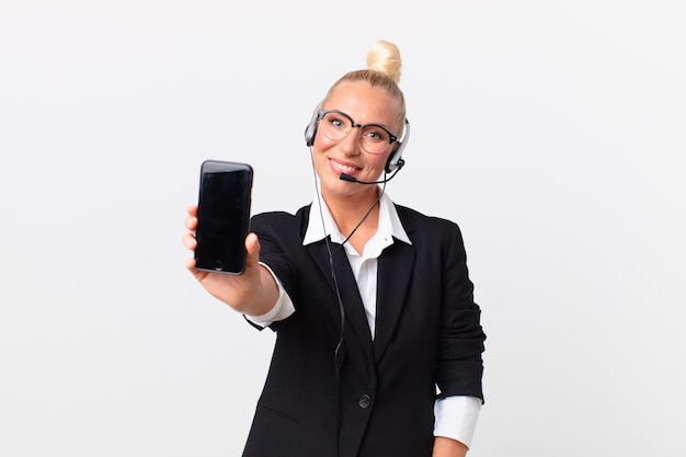 Pretty adult woman with a headset working