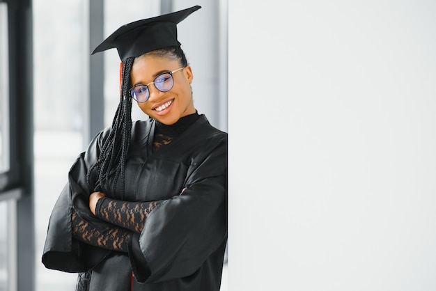 A pretty african american woman graduate