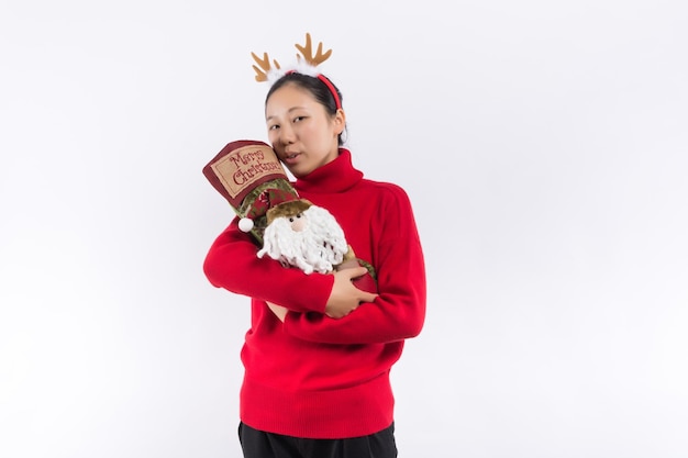 A pretty Asia young lady open gift box with white isolated background