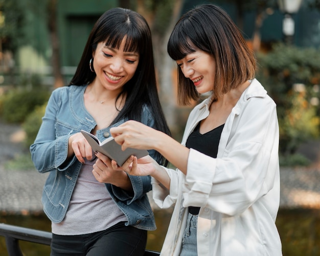 Pretty asian girls having fun together