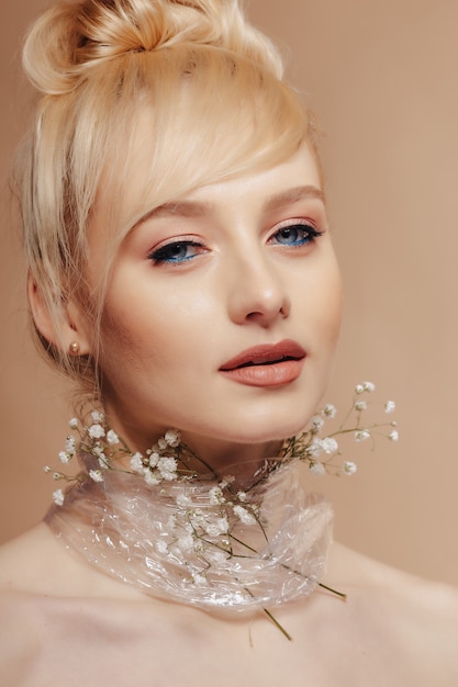 Pretty attractive girl with blond hair, fashion shooting, rose, 