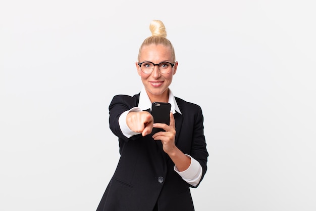 pretty blond businesswoman with a smartphone