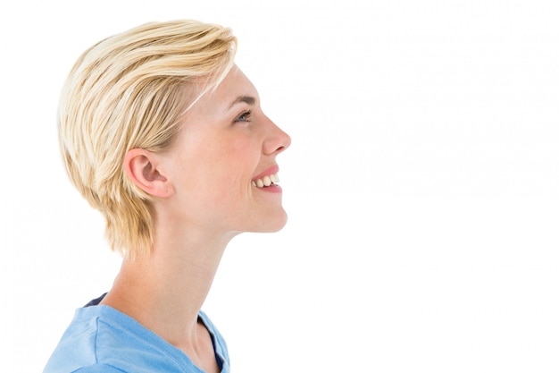 Pretty blond woman looking up