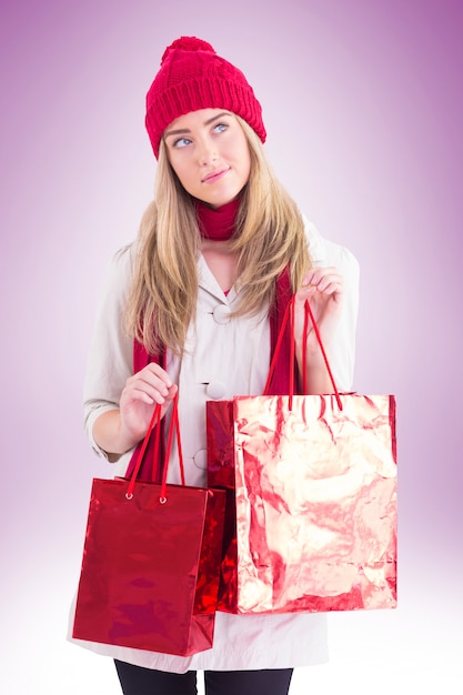 Pretty blonde holding shopping bags