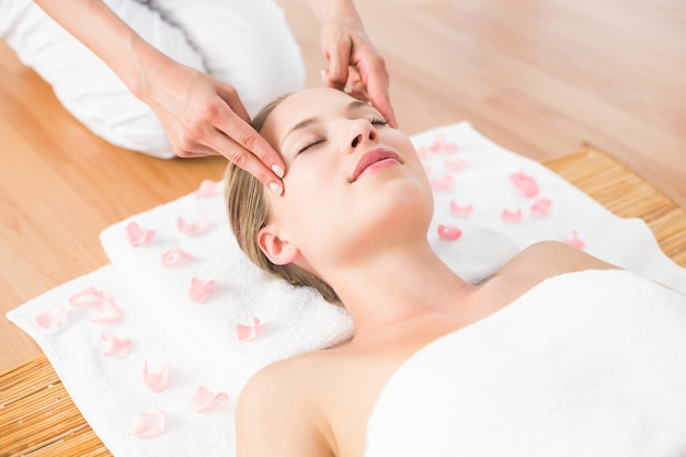 pretty blonde receiving head massage