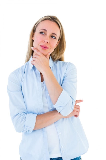 Pretty blonde thinking with hand on chin