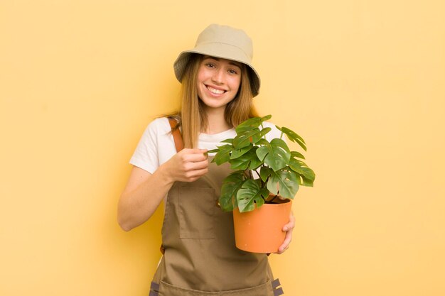 Pretty blonde woman gardener concept