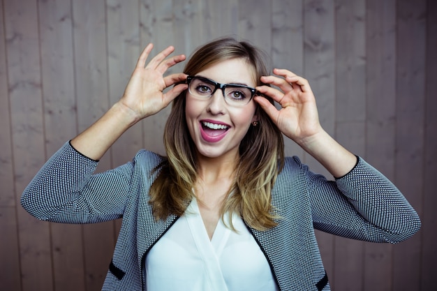 Pretty blonde woman smiling at camera