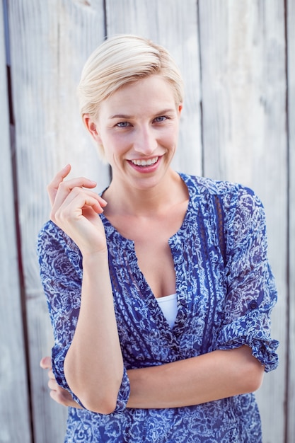 Pretty blonde woman smiling at the camera