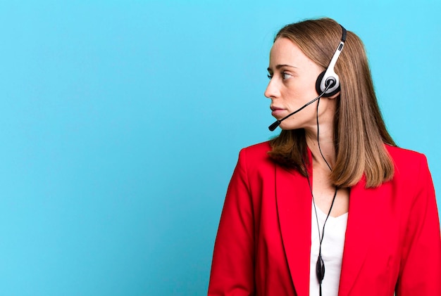 Pretty blonde woman telemarketer concept