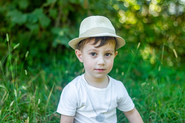 Pretty boy in a hat boy in the park