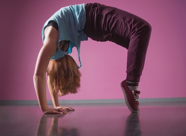 Pretty break dancer doing a back bend