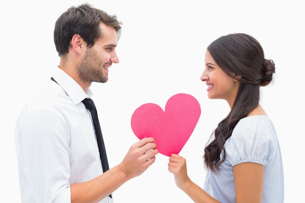 Pretty brunette giving boyfriend her heart