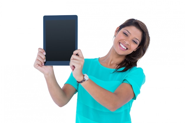 Pretty brunette showing tablet computer 