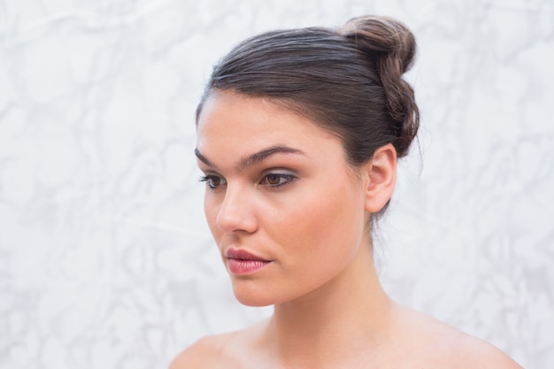 Photo pretty brunette with stylish up do