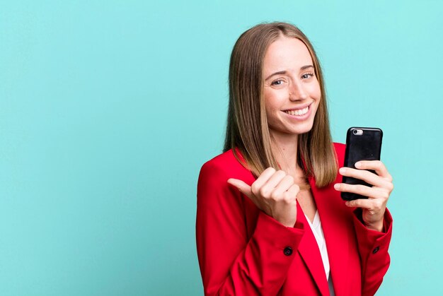 Pretty caucasian businesswoman using a smartphone