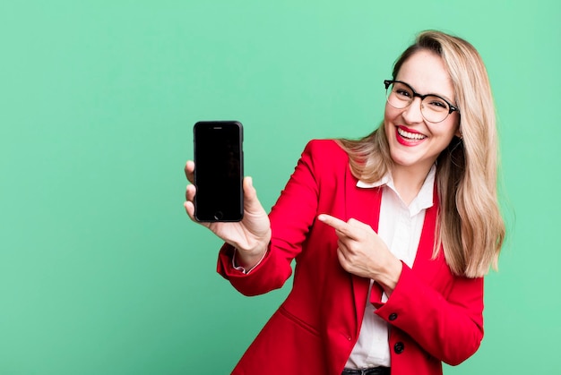 Pretty caucasian businesswoman using a smartphone