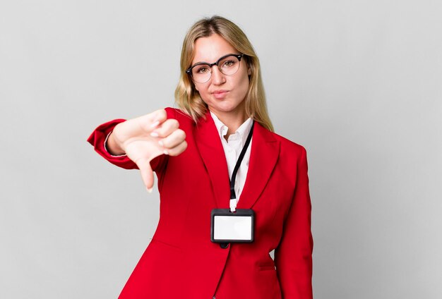 Pretty caucasian businesswoman with a vip pass acceditation card