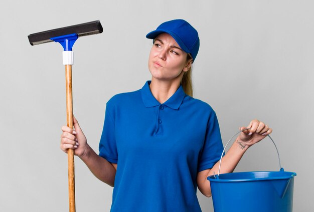 Pretty caucasian windows washer worker woman