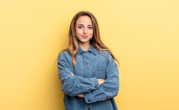 Pretty caucasian woman feeling displeased and disappointed, looking serious, annoyed and angry with crossed arms