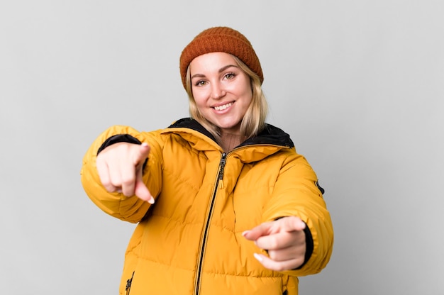 Pretty caucasian woman wearing an anorak cold and winter concept