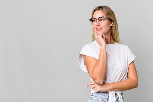 Pretty caucasian woman with a copy space to the side