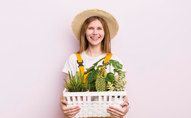 Pretty caucasic woman with plants gardering concept