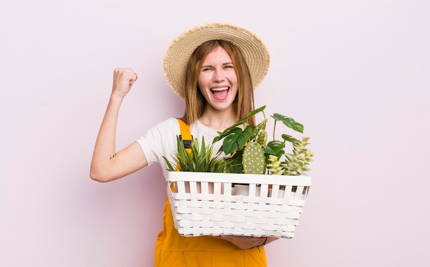 Pretty caucasic woman with plants gardering concept