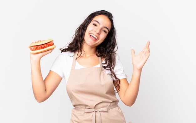 pretty chef woman with a hot dog