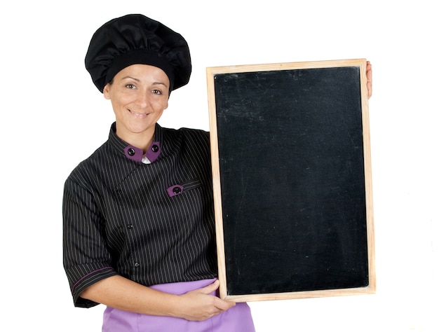 Pretty cook woman with blackboard isolated on white background