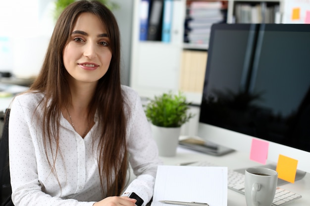 Pretty designer in modern office