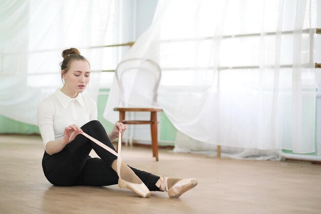 Pretty girl ballet dancer practicing