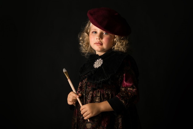 Pretty girl in brown old-fashioned costume