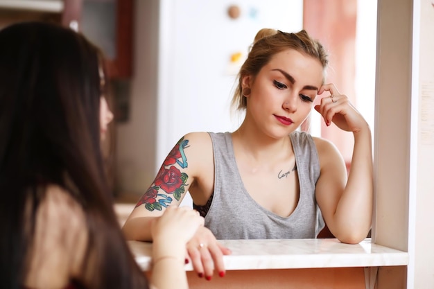 Pretty girl posing at camera in retro apartment EmotionLife style Kitchen Relationship