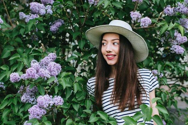 pretty girl posing with hat