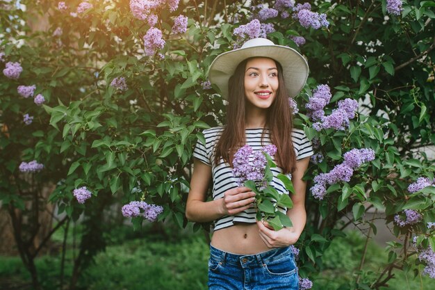 pretty girl posing with hat