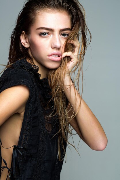 Pretty girl in sexy black vest