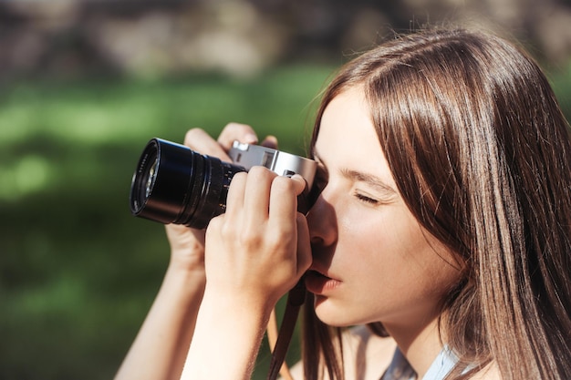 Pretty girl takes photo