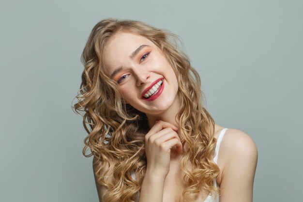 Pretty girl with blonde curly portrait