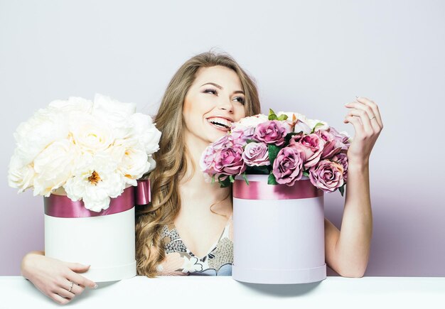 Pretty girl with flower boxes