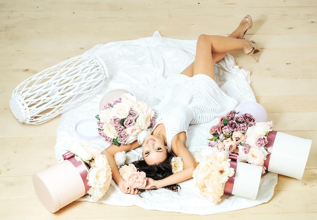 Pretty girl with flower boxes