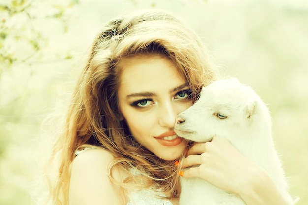 Pretty girl with goat