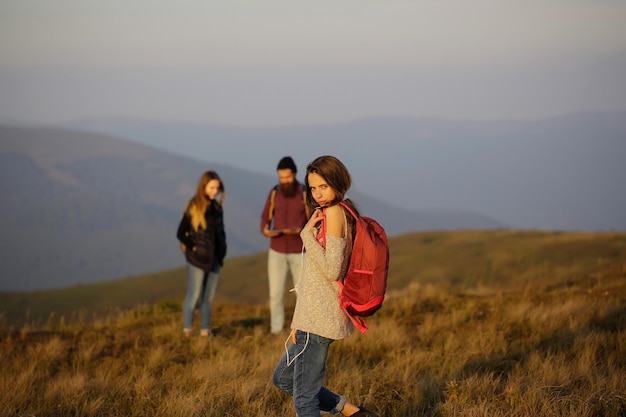 Pretty girl with red backpack