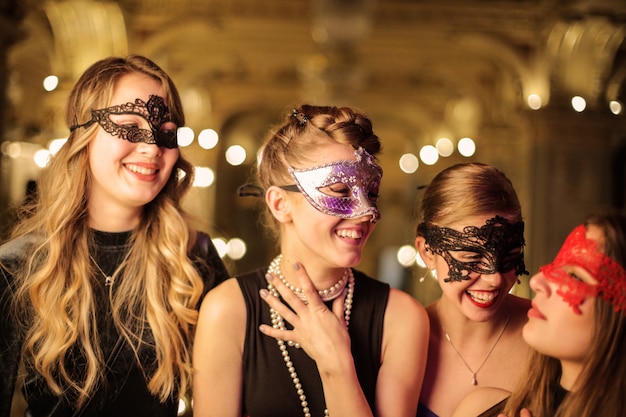 Pretty girls on a masquerade ball