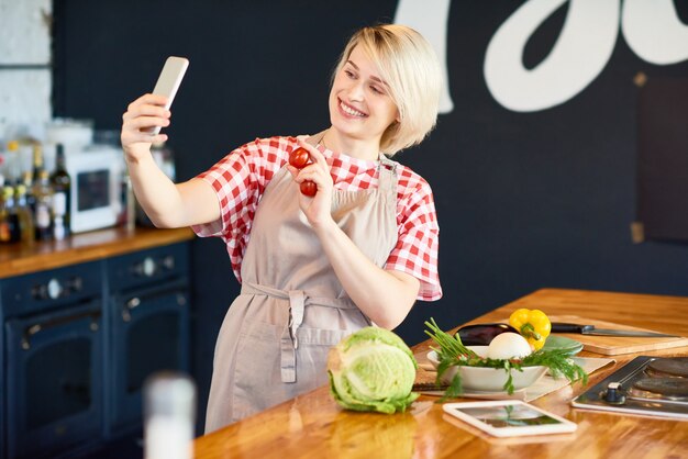 Pretty Housewife Taking Selfie